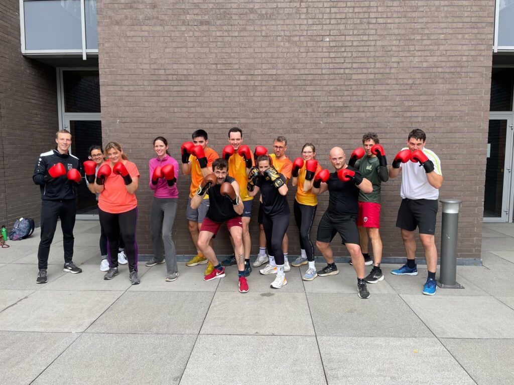 Zuiderpoort colleagues in boxing gloves during Power Hour with Fit on Wheels